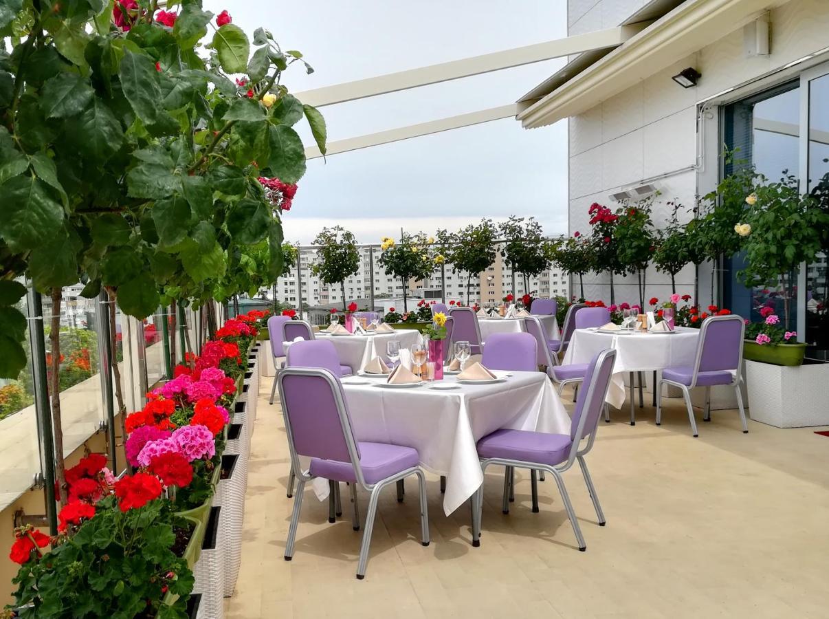 Marshal Garden Hotel Bucharest Exterior photo The terrace of the restaurant
